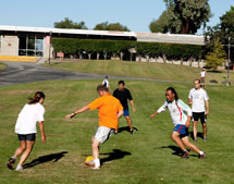 A slice of the action during the 2010 SSI versus SLAC soccer game. SSI outscored SLAC by one goal. 