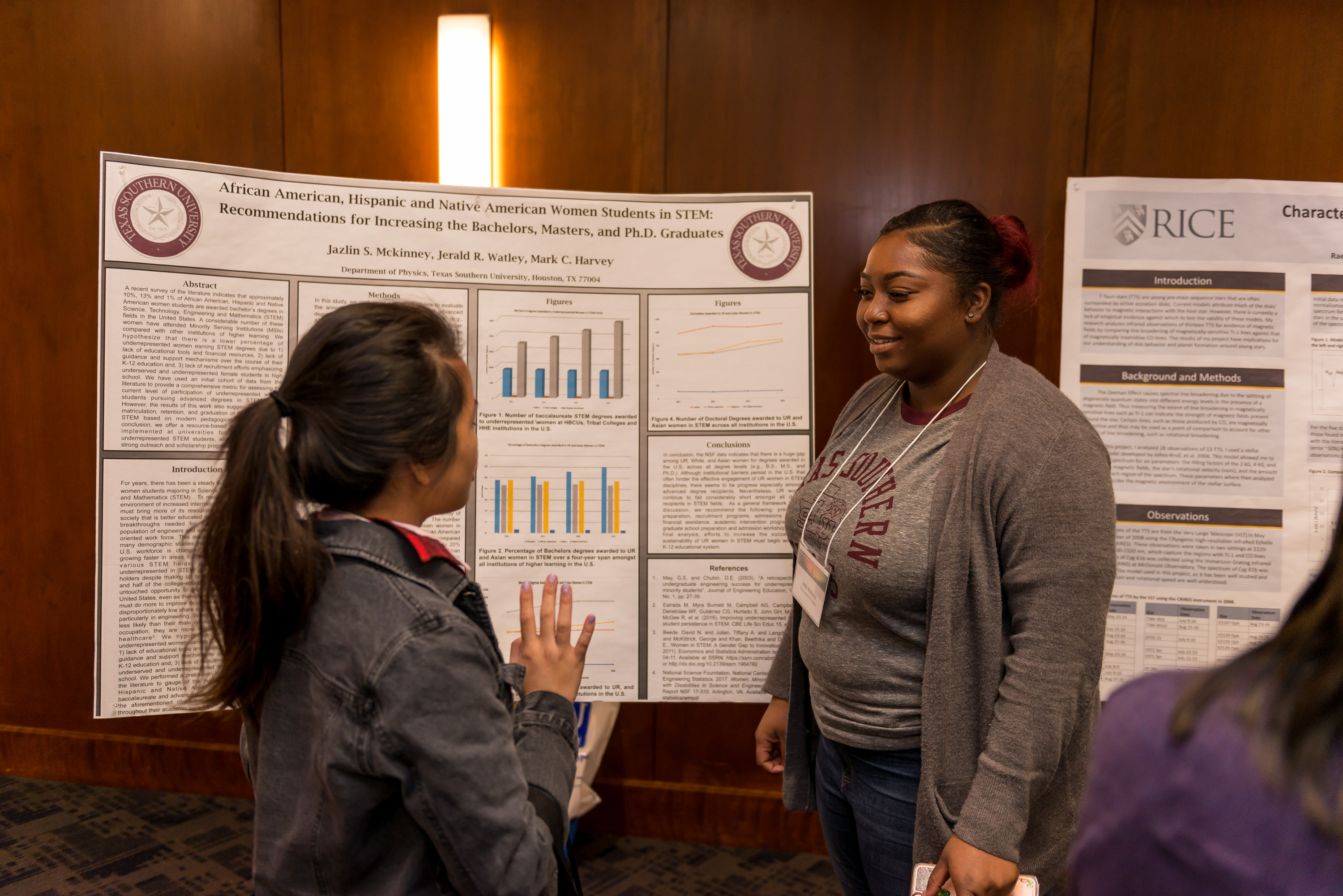 Photo of Jazlin McKinney of TSU discusses her research topic, “African American, Hispanic and Native American Women