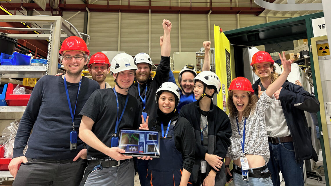 group of students wearing hard hats